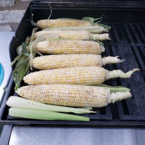 Begin Grilling Corn