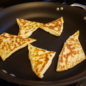 Finished Homemade Naan in a black skillet