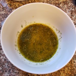 spices in olive oil in a bowl