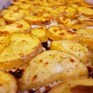 Golden Roasted potatoes on a baking sheet lined with parchment paper