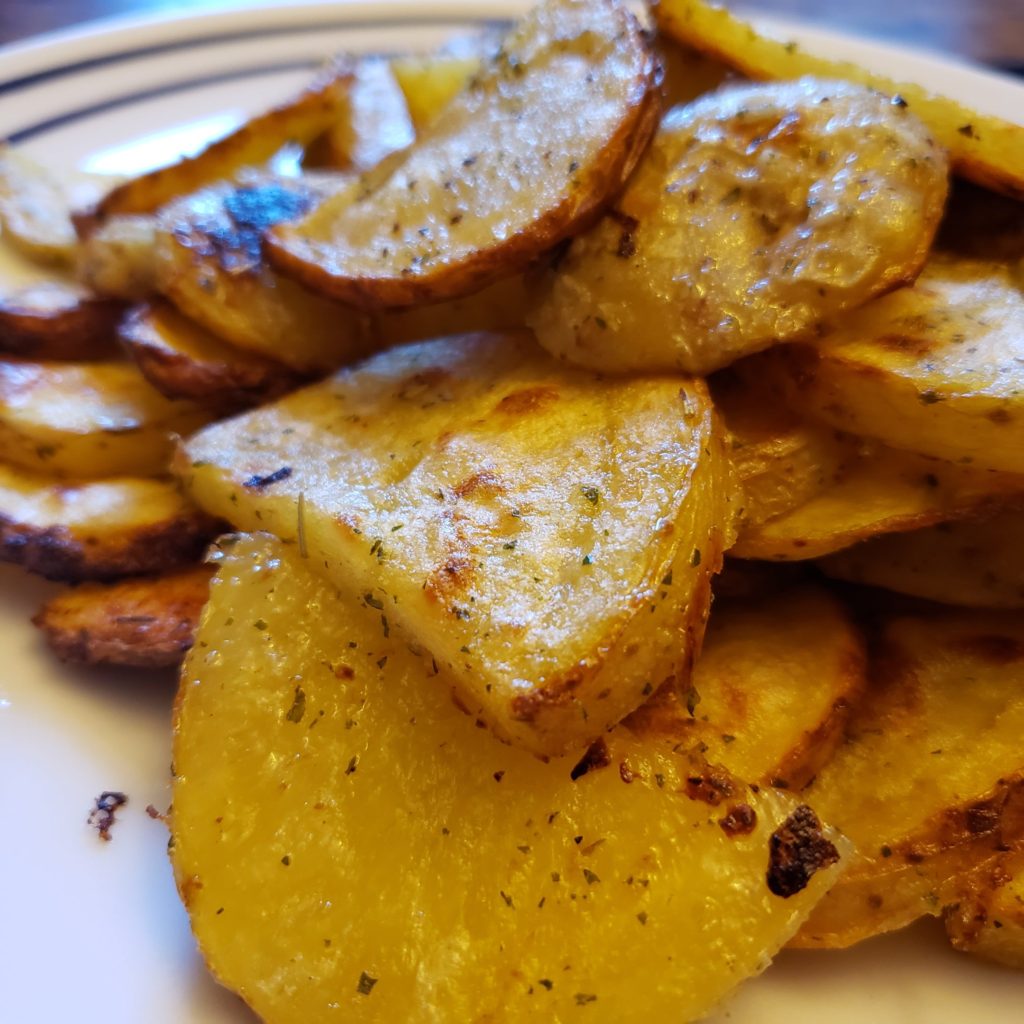 Seasoned Roasted Potatoes on a white plate