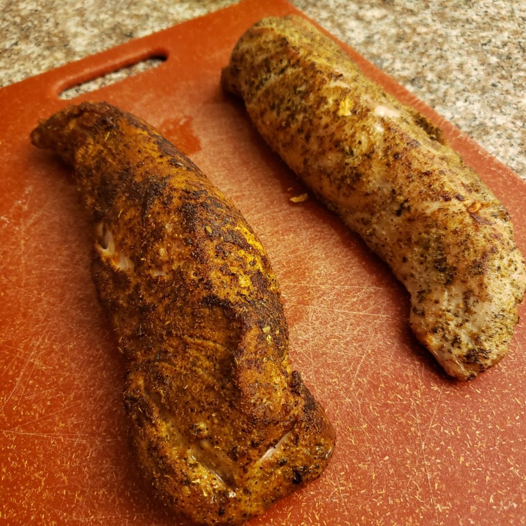 Pork Tenderloin on a Red Cutting Board