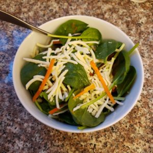 Improved Imo's Salad in a white bowl