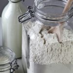Self-Rising Flour in a Glass Jar, with milk and salt in the background